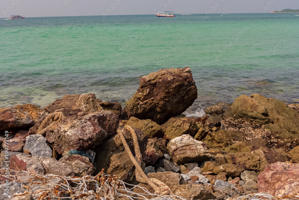A rocky part of the beach in Koh Larn