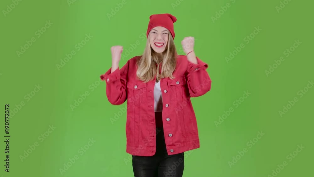 Teenager is pleased with his victory in the contest. Green screen Teenager is pleased with his victory in the contest. Green screen