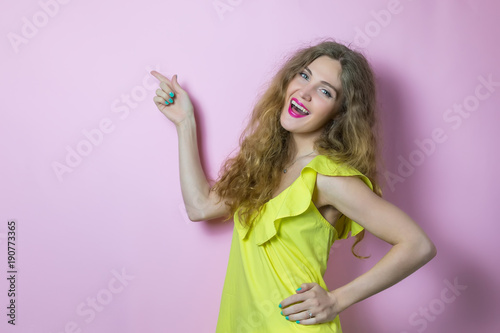 Happy woman wearing yellow dress for advertising