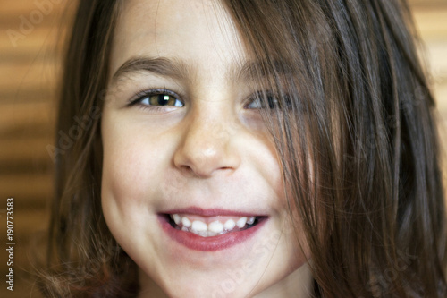 Beautiful little girl with a dazzling smile