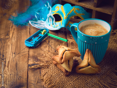Hamantaschen cookies and coffee cup