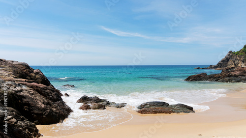 Beautiful scenery landscape of tropical sea and wave crashing on sandy shore in thailand.