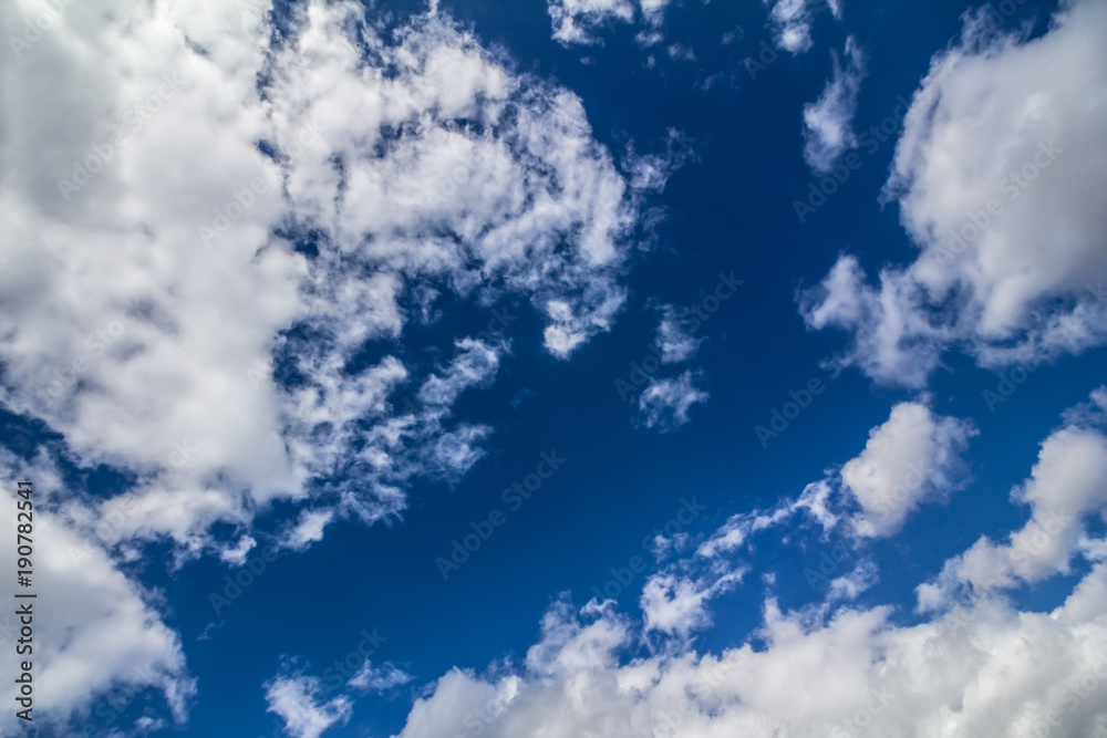 Bright blue sky and white clouds in clear weather appropriate for background Bright blue sky and white clouds in clear weather appropriate for background