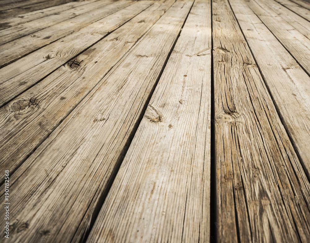 Close up of composite decking. Wood planks. Kiln dried wooden lumber texture background. Timber hardwood wall.(selective focus)