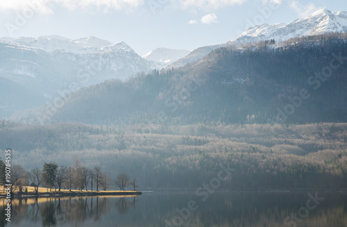 Fototapeta Naklejka Na Ścianę i Meble -  Scenic Bohinj lake with its surrounding nature in Slovenia