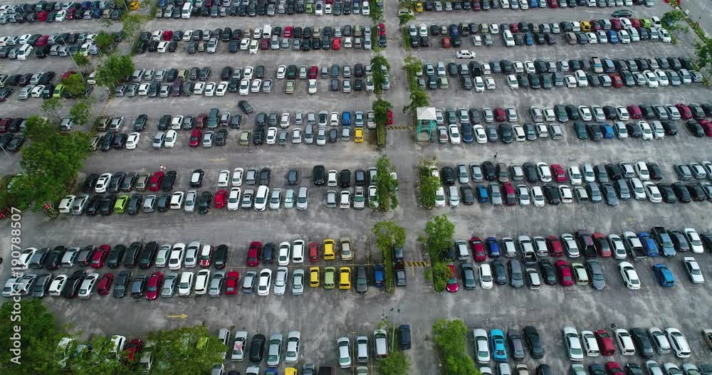 Car movement inside open car parking lot from above, Malaysia Car movement inside open car parking lot from above, Malaysia