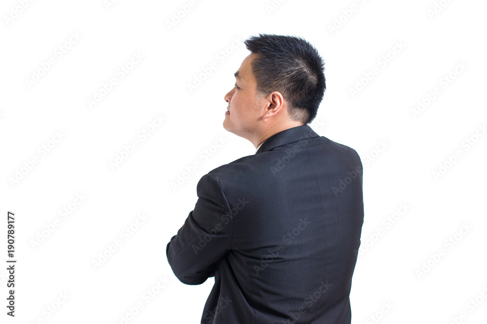 Asian businessman wear black suit Stand up to the back with crossed arms and look at the left hand side. isolated on white background. Business concept. Asian businessman wear black suit Stand up to the back with crossed arms and look at the left hand side. isolated on white background. Business concept.