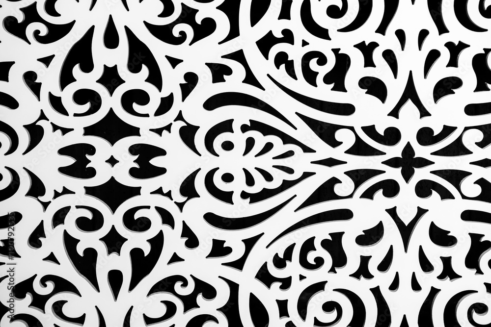 Carved relief white ornament. Ornate decorative detail in the design. Patterned contrast panel.