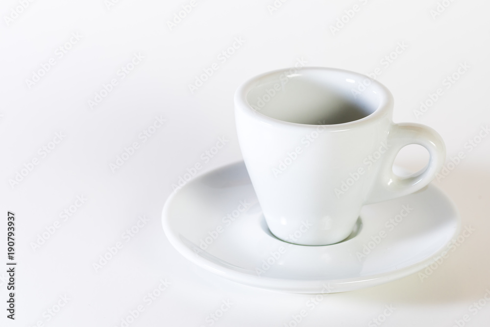 Coffee or espresso cup with coffee beans plain white background Coffee or espresso cup with coffee beans plain white background