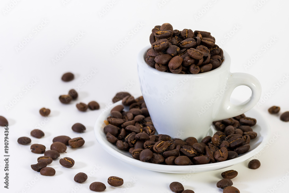 Coffee or espresso cup with coffee beans plain white background Coffee or espresso cup with coffee beans plain white background