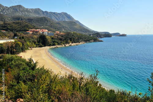 Beautiful beach and mountains on background