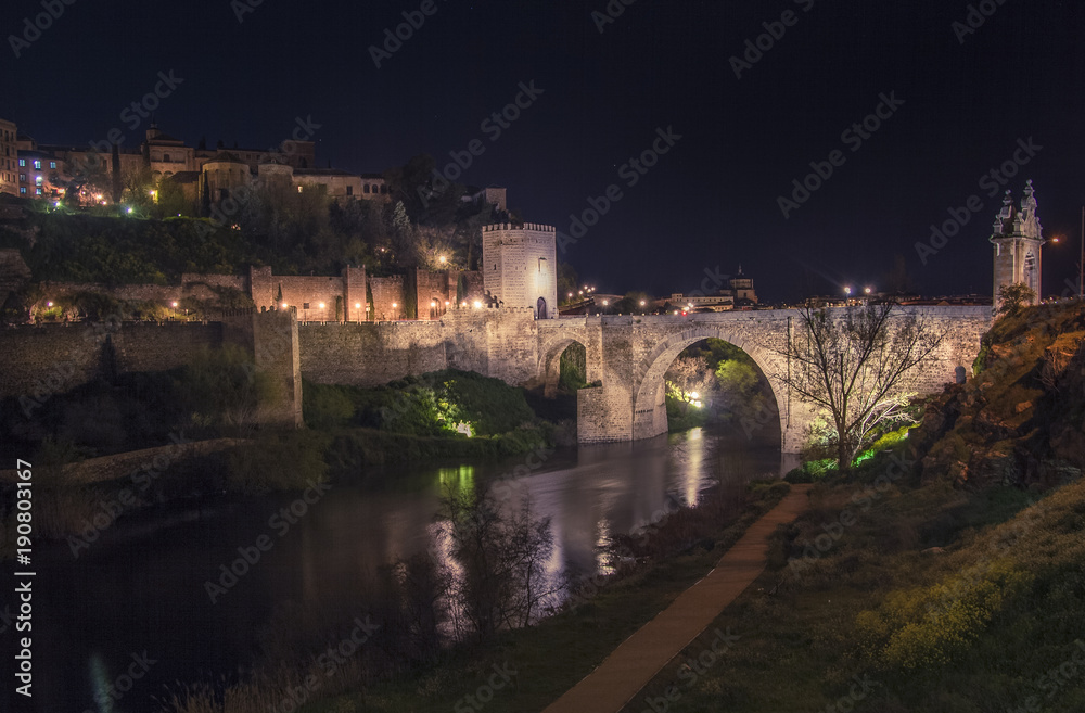 Night view of the Alcantara bridge in Toledo. The Historic City of Toledo was declared a World Heritage Site by UNESCO in 1986