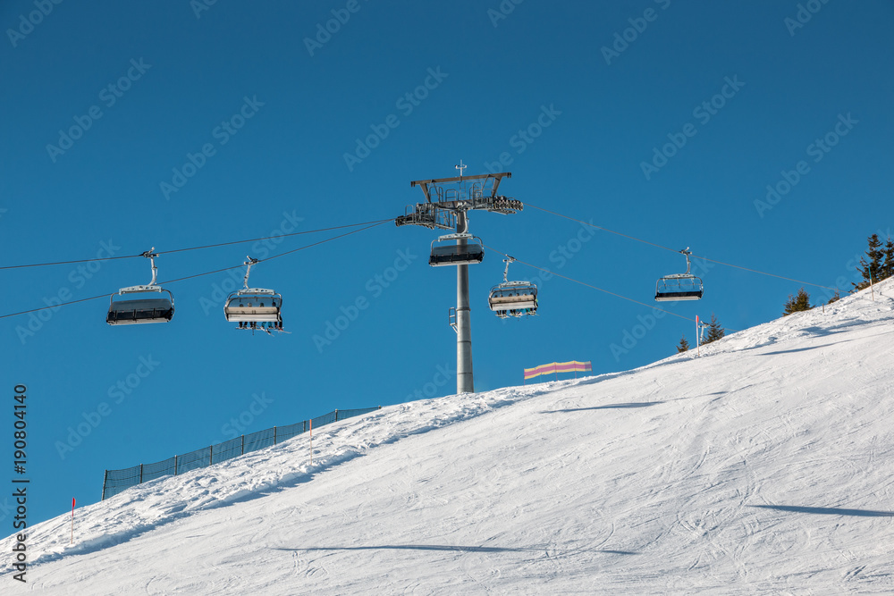 Ski lift and snow in the mountains