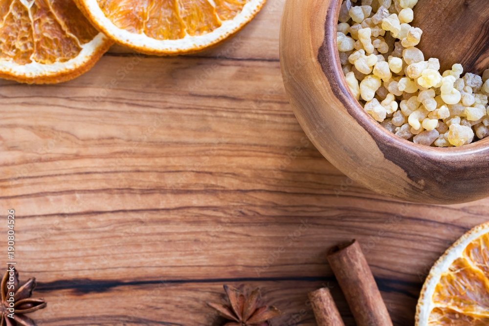 Frankincense resin in a mortar with copy space Frankincense resin in a mortar with copy space