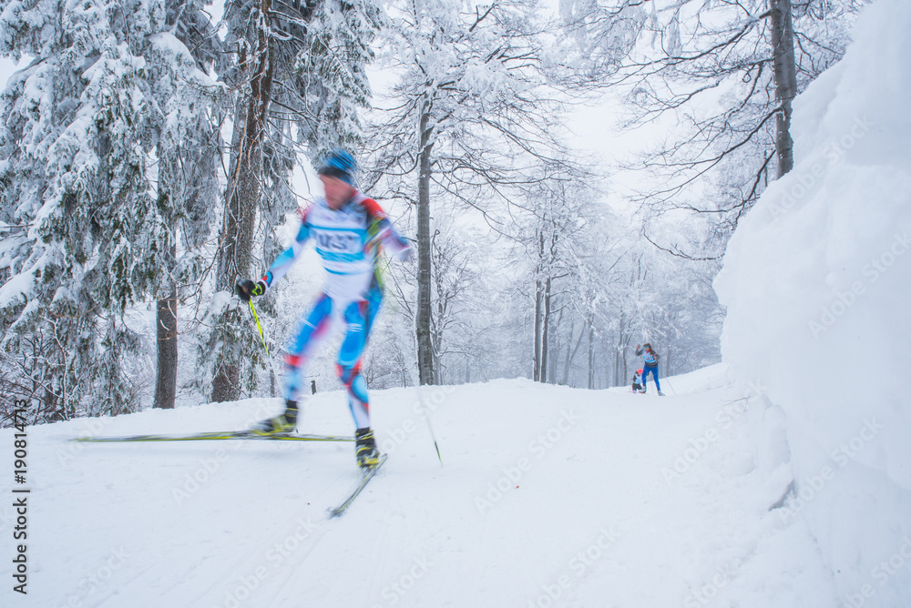 A woman cross-country skiing in the Alps A woman cross-country skiing in the Alps