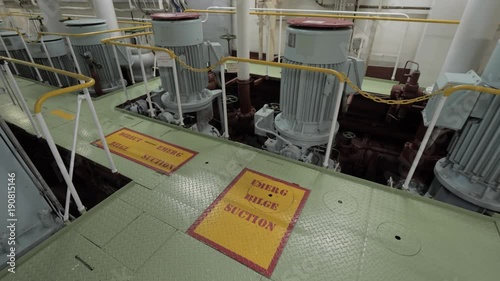 Emergency pumps with electric motors in engine room of ship