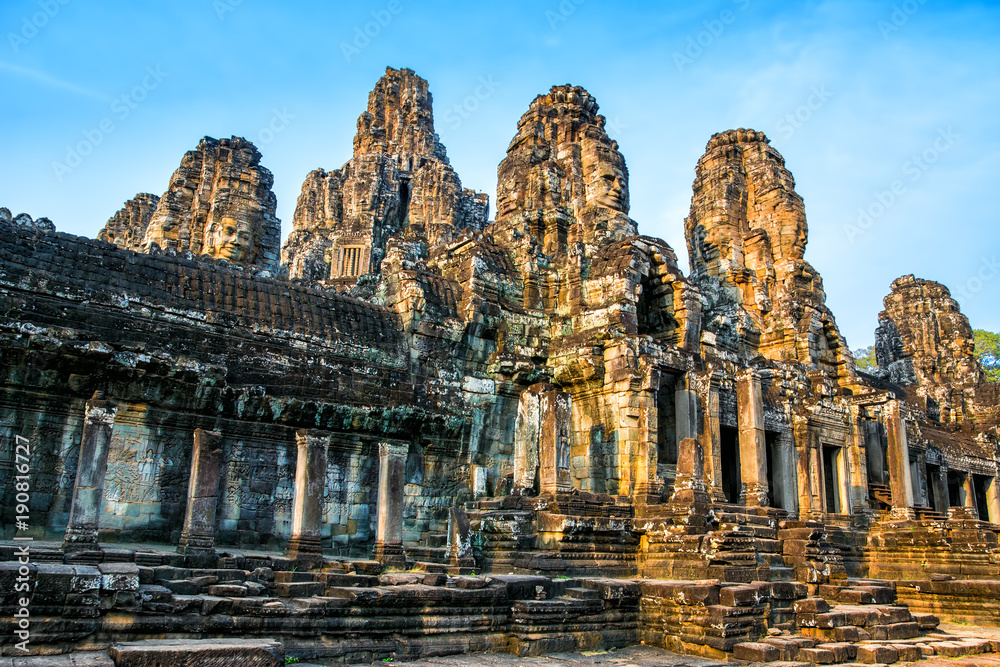 Fototapeta premium Beautiful Bayon temple in Angkor Thom on the sunset. Ancient Khmer architecture. Location: Siem reap, Cambodia.er architecture.