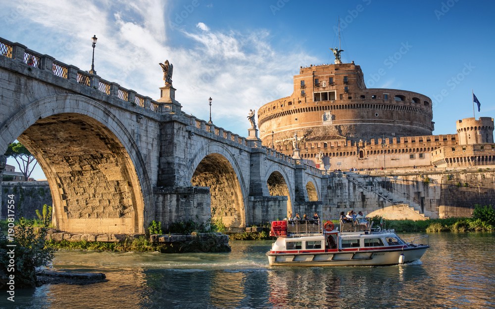 Boat on the Tiber river near Sant Angelo bridge and castle in Rome, Italy