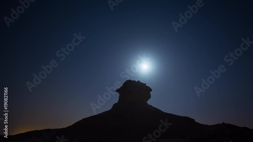 Qatar desert night moon waterless heat sand supermoon behind the stone photo