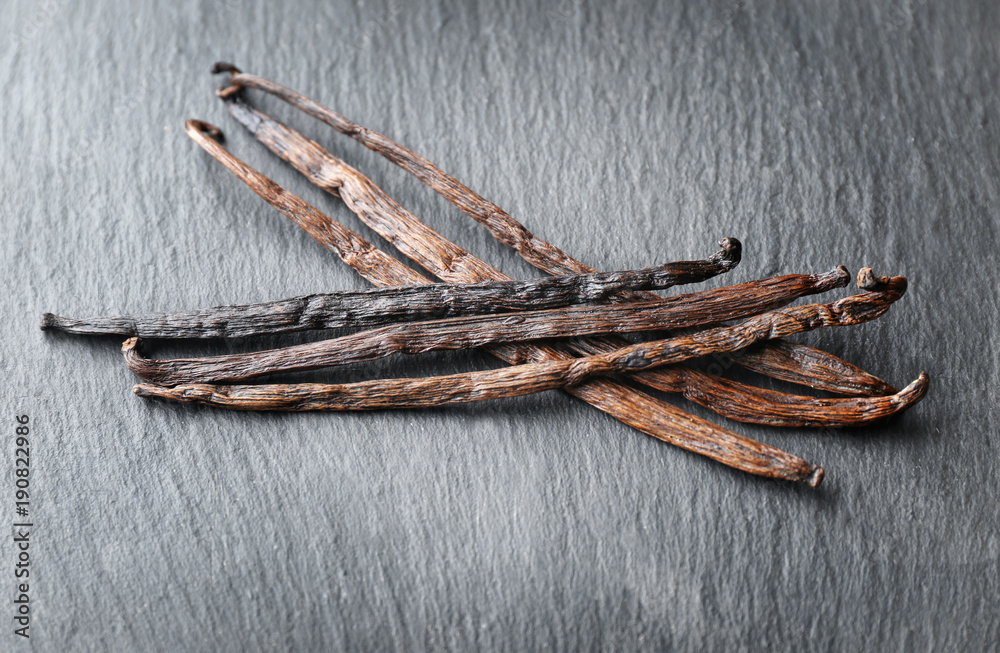 Vanilla sticks on dark background Vanilla sticks on dark background