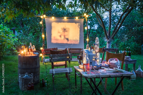 Open-air cinema with drinks and popcorn in the garden
