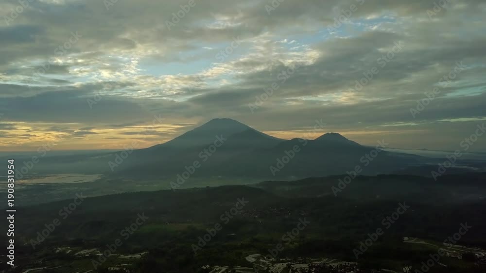 Beautiful aerial view of mountain peak on misty morning from a drone flying upward in Semarang, Indonesia. Shot in 4k resolution Beautiful aerial view of mountain peak on misty morning from a drone flying upward in Semarang, Indonesia. Shot in 4k resolution