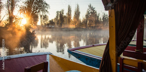 Beautiful hand-painted trajineras, traditional colorful boats from Xochimilco used to navigate in the canals