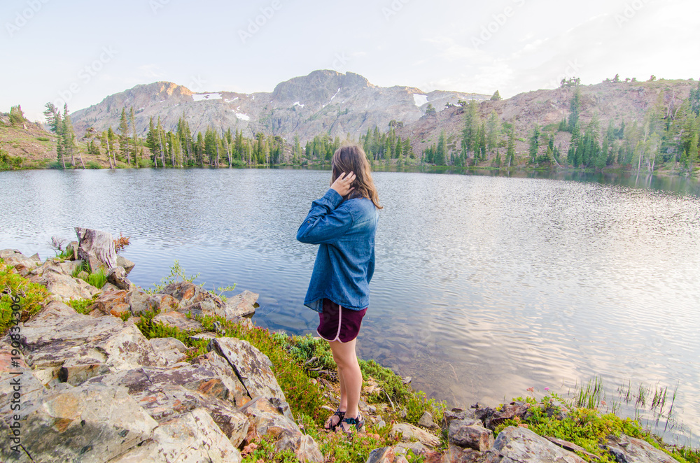 Girl Looking at Mountain Lake