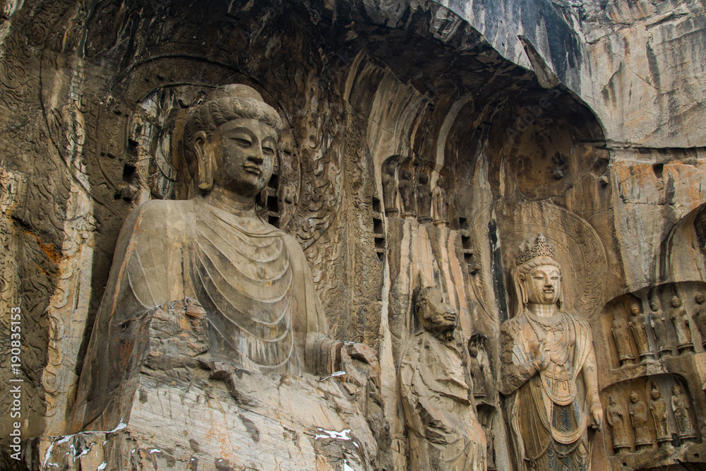 Close-up Stone Buddha Statue Carved from the mountains.