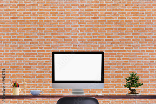 Comfortable workplace with modern desktop computer. Blank screen for graphic display montage. 