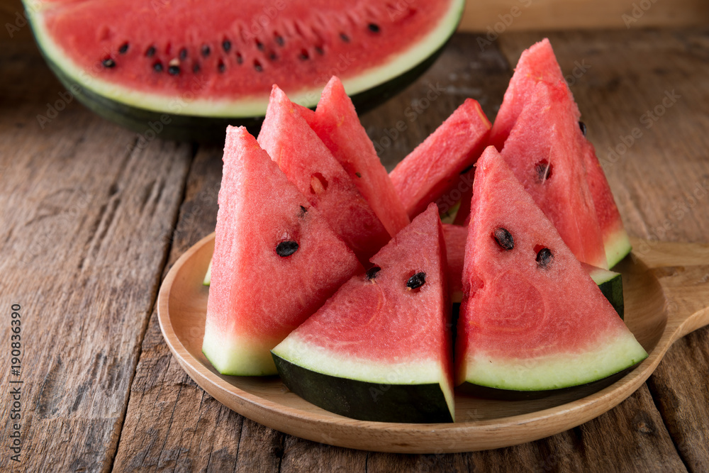 Watermelon on wooden table background Watermelon on wooden table background