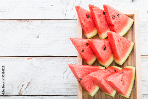 Watermelon on wooden table background