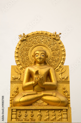 Sitting Buddha On a white sky background.