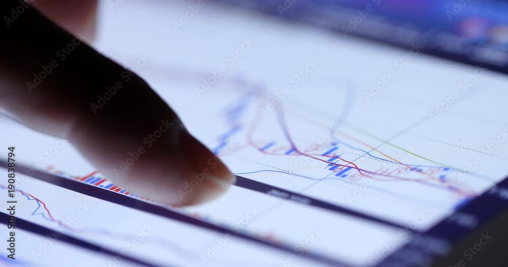 Finger touch on the stock market graph