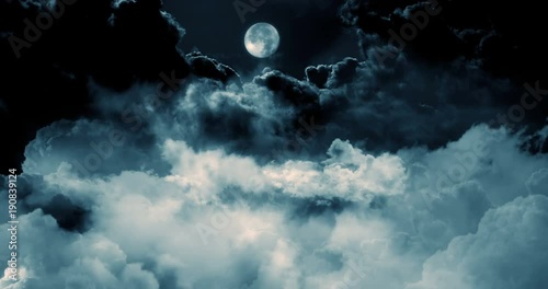 Flying over the clouds at night