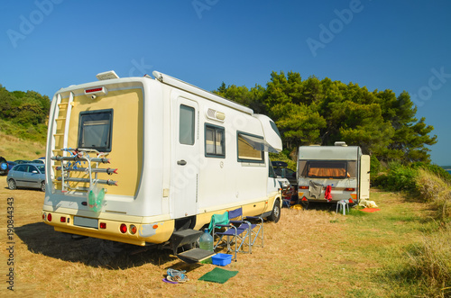 caravan  car modern beside the beach near to pine trees - Greece
