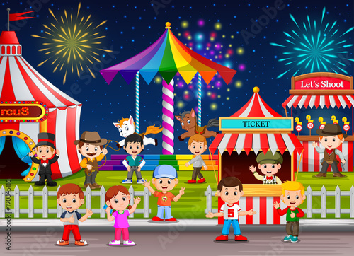 Many Childrens and people worker having fun in amusement park at night