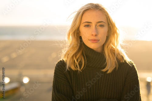 Young caucasian woman serious face portrait