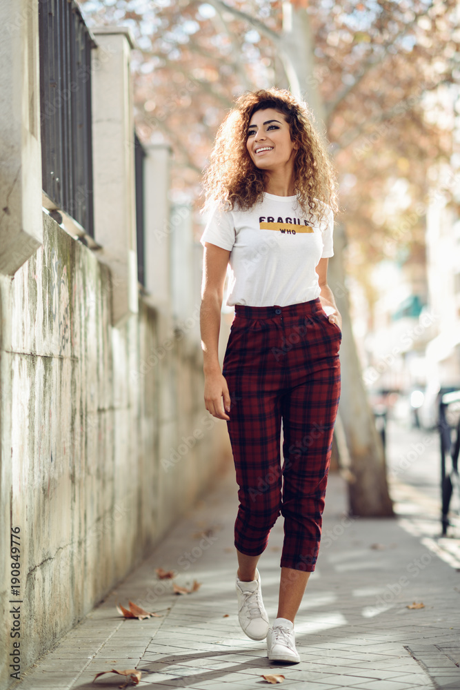 Arab girl in casual clothes in the street. Arab girl in casual clothes in the street.