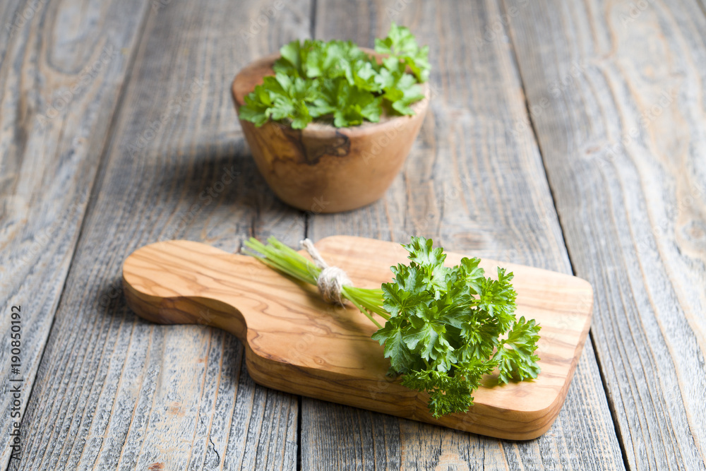 Fresh parsley on wood