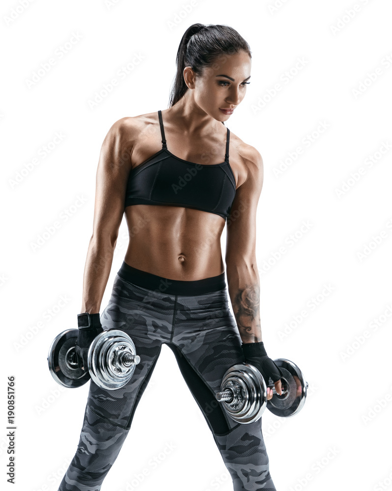 Photo of athletic beautiful woman doing exercise while working out