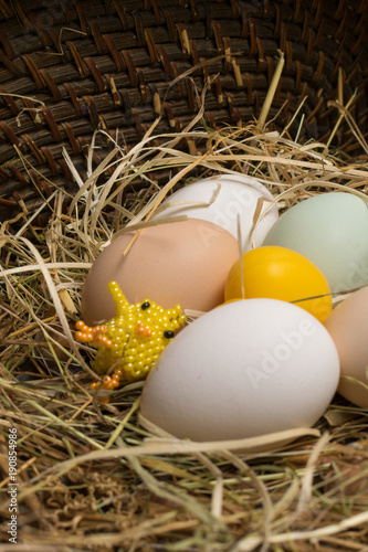 easter eggs in straw with chisel from beads photo