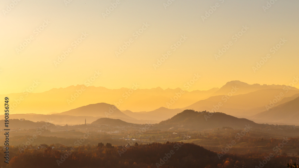 colorful autumn sunset in the italian countryside