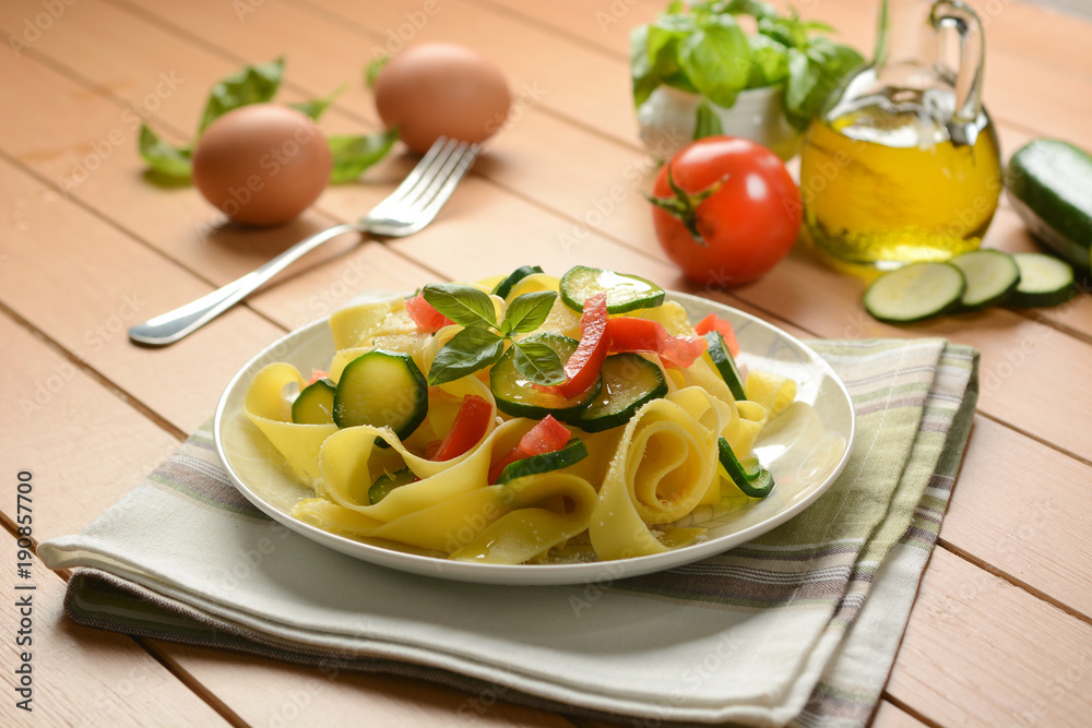 egg pappardelle with zucchini and tomato