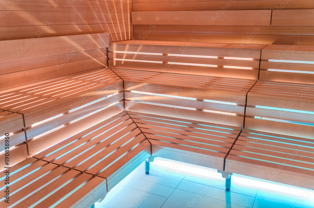 Finnish sauna. Benches, lighting and wall covering for sauna