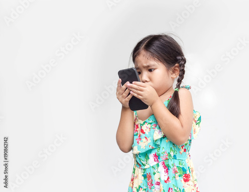asian girl move her eye so close mobile to watch