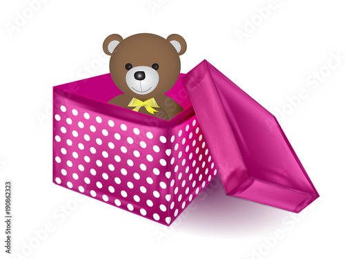 Open festive gift box red or red-burgundy with toy. Tied with pink ribbon with a bow on top.