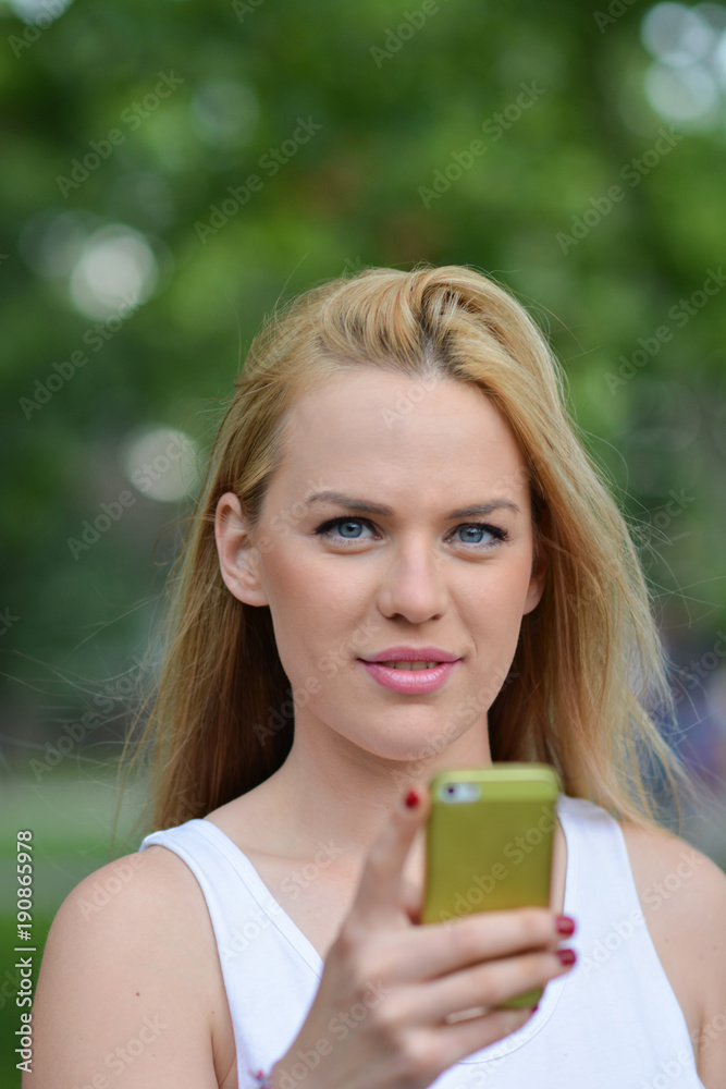 Young blonde girl with smart phone Young blonde girl with smart phone