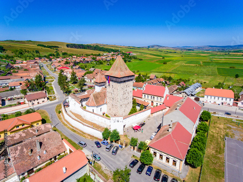 Homorod Fortified Church build by the German Saxons in Transylvania. Aerial view photo