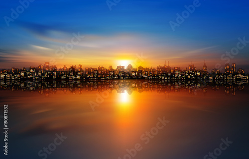 abstract nature background with panorama of city clouds and sunset